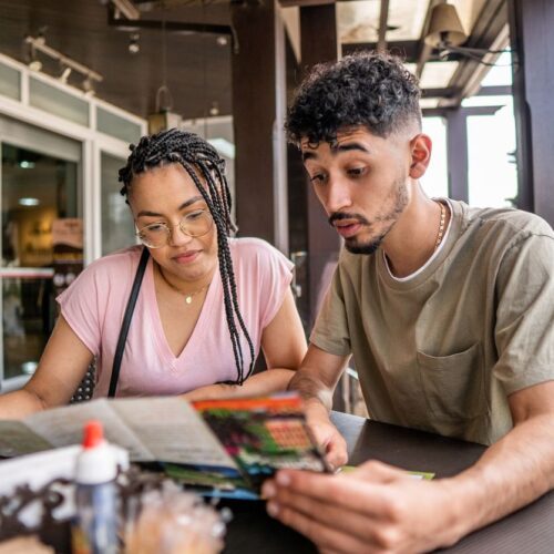 Couple reading flyer together